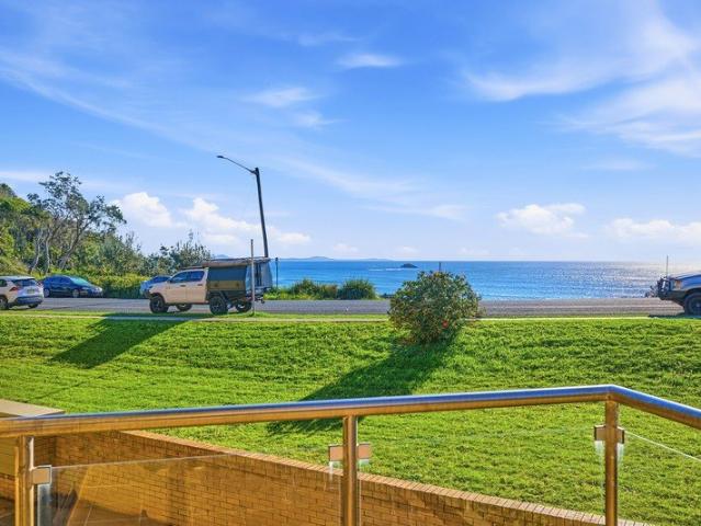 An Address Framed by the Ocean at Flynns Beach