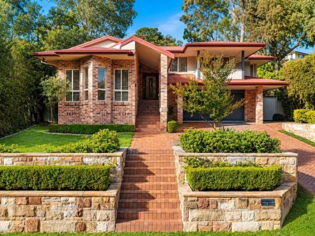 An Architecturally Designed Family Retreat with a Bushland Outlook with self contained Granny Flat