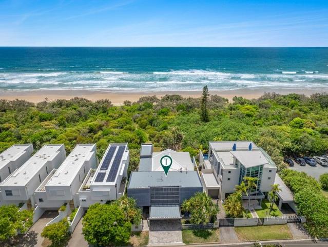 A Rare Beachfront Opportunity: Award Winning Coastal Luxury