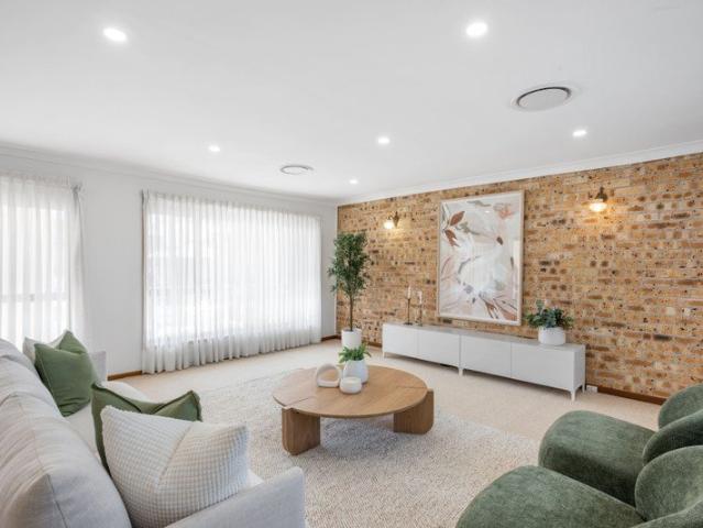 An elevated family residence with impressive proportions and expansive views