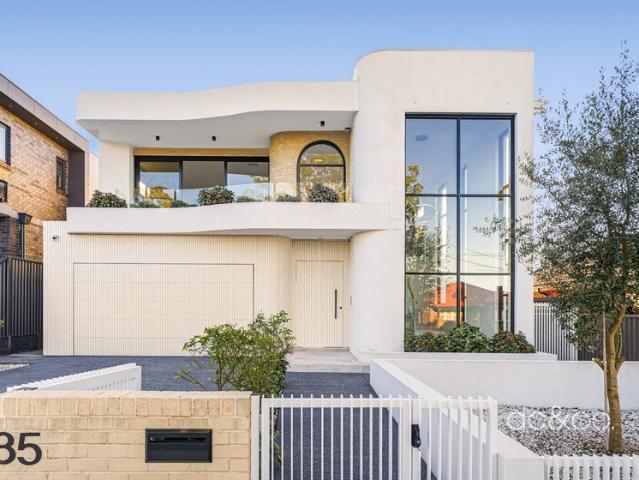 An elevated family residence with sweeping space and abundant natural light
