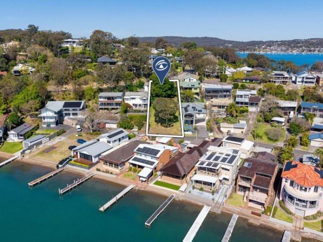 An Elevated Lakeside Canvas Two DAs, Dual Access, Endless Potential