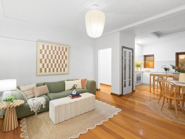 An elevated, north facing, one of a kind modern Deco find