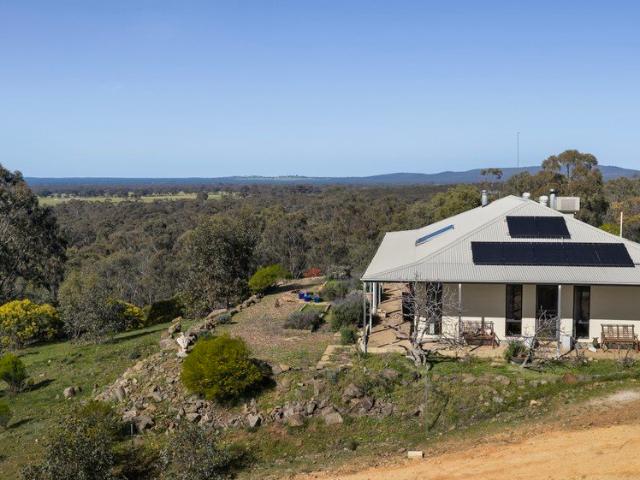 An Elevated Retreat with Spectacular Views