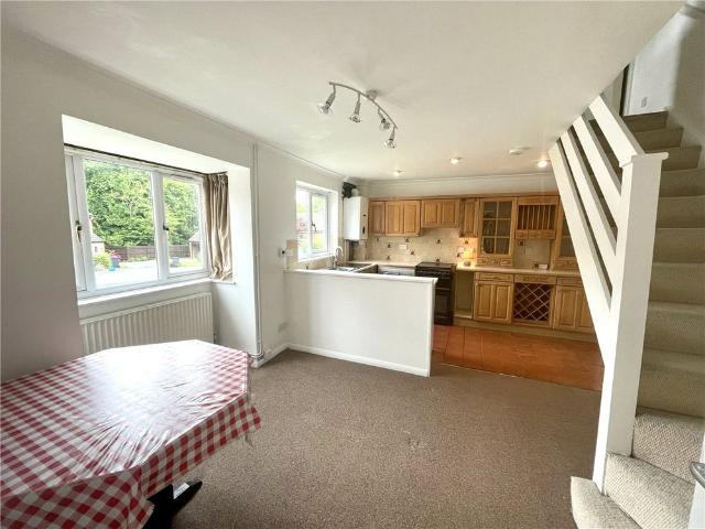 An end terrace one bedroom house with enclosed garden and driveway parking situated within walking distance from the popular Marlborough High Street
