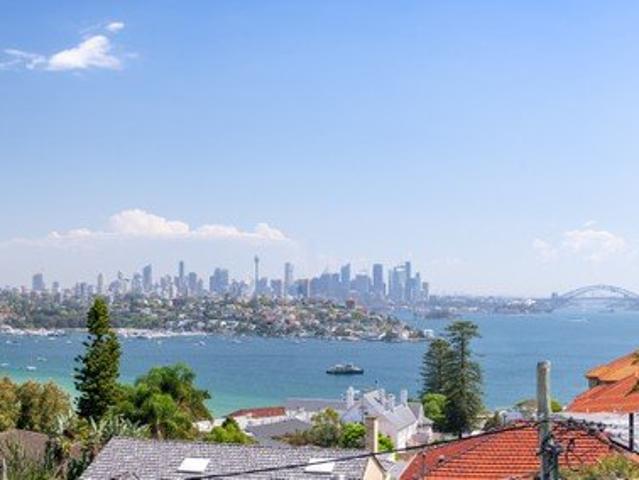 An Entertainer's Dream Luxuriously Appointed, Newly Built Family Residence offers Expansive Harbour to City Views