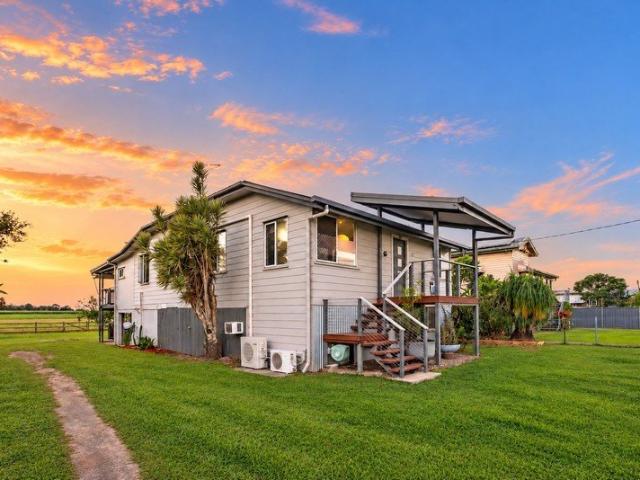 AN ENTERTAINER'S DREAM NESTLED ON 1,012M2 WITH VIEWS, SIDE ACCESS AND A SPACIOUS DECK