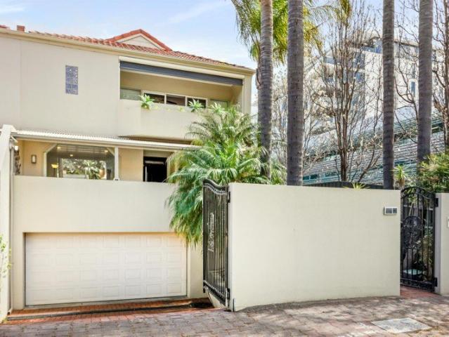 An Entertainer's Haven of Architectural Scale in an Urban Garden Paradise