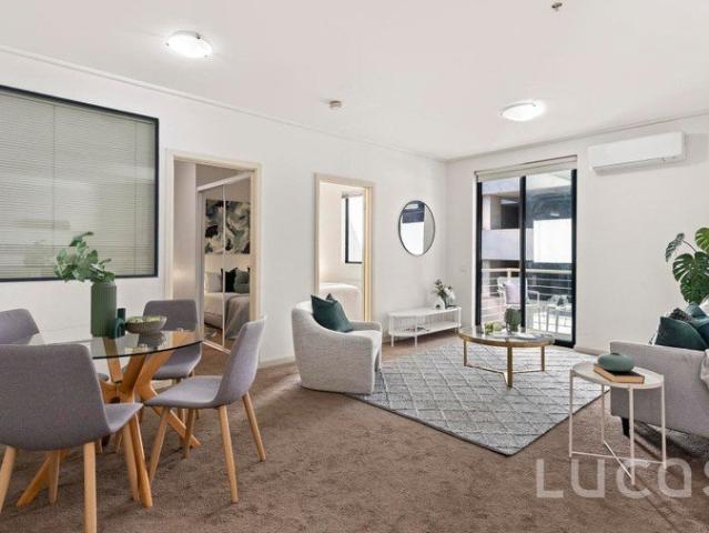 AN ENTRY LEVEL CITY BEAUTY IN THE BUSTLING MIDDLE OF THE ACTION