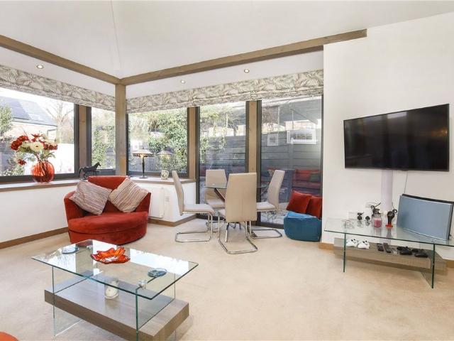 An exceptional two bedroom apartment with a garage in this stunning Victorian Villa overlooking Clifton Green