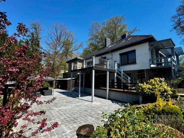 An exceptional villa with a self contained studio and woodla