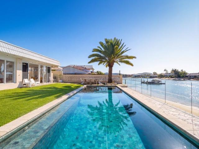 An Exceptional Waterfront Estate with Rare Wide Water Presence