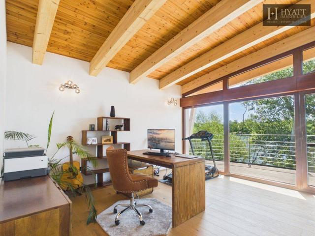 An Exceptional Waterfront Retreat with Private Beach and Unrivaled Privacy