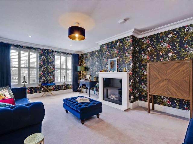 An exceptional detached home situated in an exclusive gated development