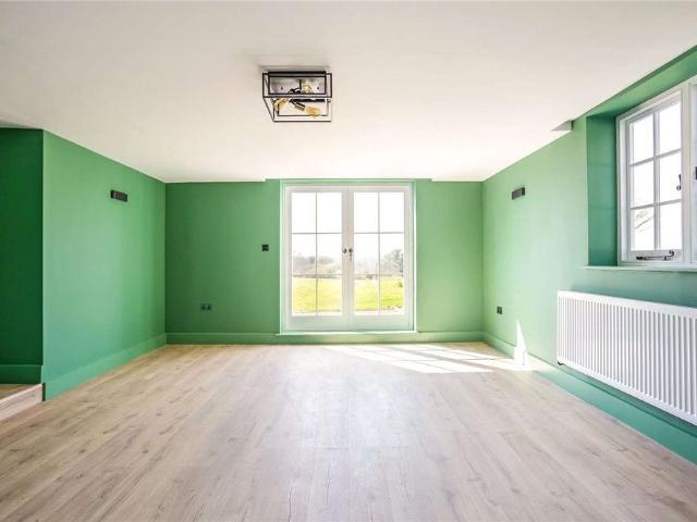 An exceptional family home with outstanding views of Hamptworth golf course