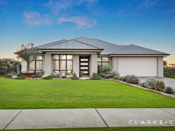 AN EXCEPTIONAL FAMILY HOME WITH A STUNNING POOLSIDE RETREAT!