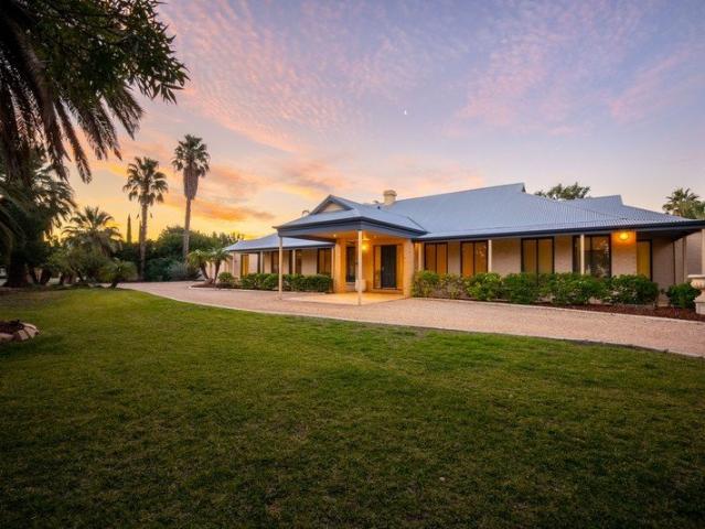 AN EXCEPTIONAL FAMILY RETREAT WITH RESORT STYLE LIVING