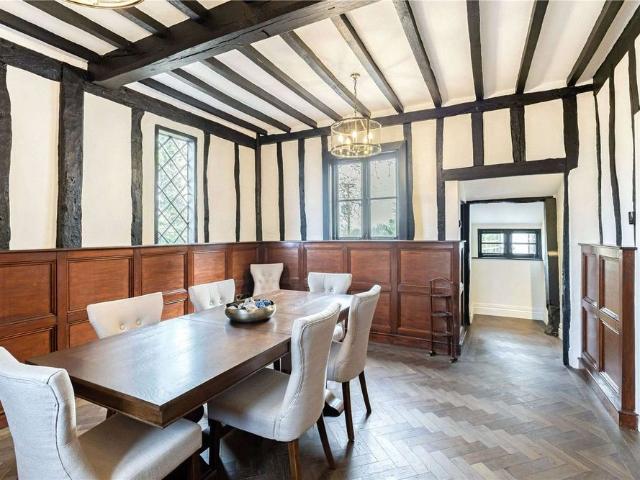 An exceptional five bedroom recently renovated period home combining original character features with a high quality modern specification