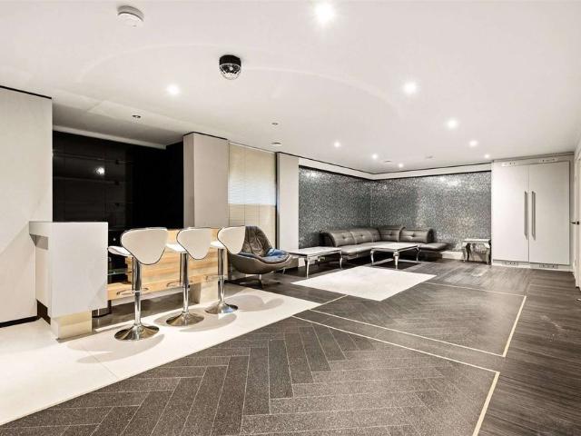 An exceptional gated residence extending to approximately 6,500 sq ft, set on one of Bramhall’s most prestigious addresses