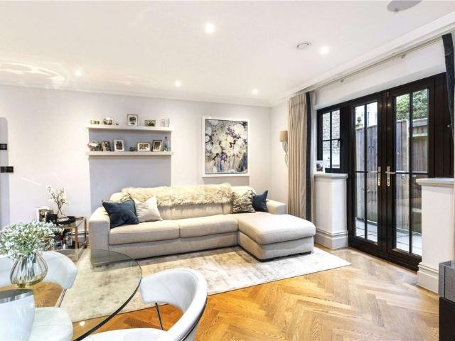 An exceptional ground floor apartment with a private garden, located behind secure gates in a serene and high quality development, close to the centre of Guildford