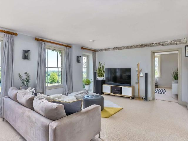 An exceptional Grade II* listed home with panoramic views across the Weald