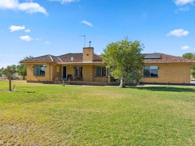 An Exceptional Lifestyle Holding on 15 Pristine Acres