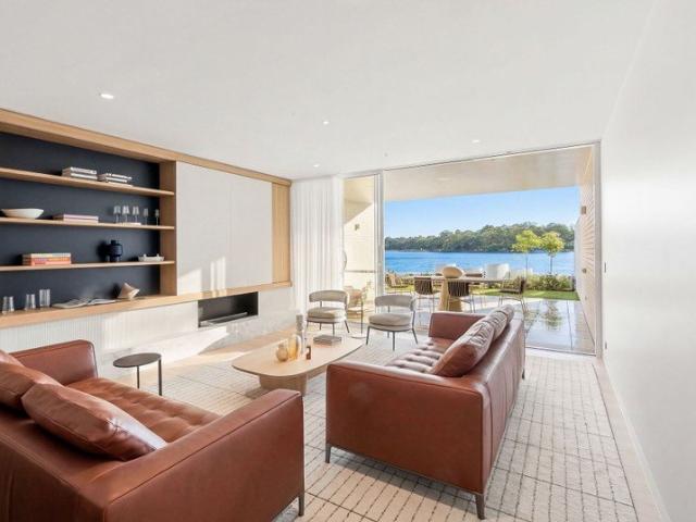 AN EXPANSIVE WATERFRONT THREE BEDROOM RESIDENCE