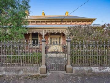 An Exquisite Victorian Residence with a Commanding Street Presence