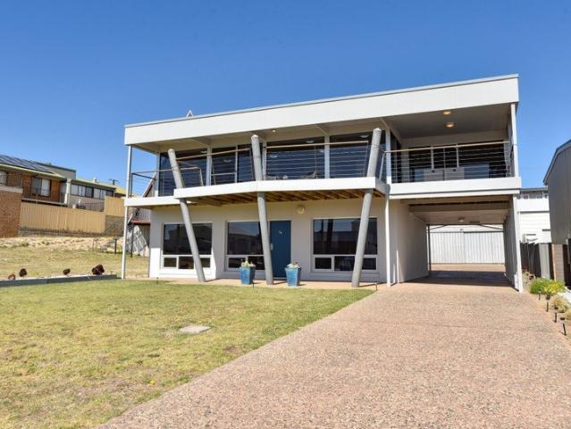 An Iconic Coastal Masterpiece with Rivoli Bay Views