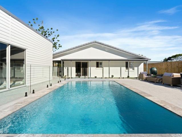 An Impeccable Coastal Home, Moments from the Surf