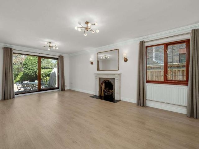 An impressive five bedroom family home offering spacious and thoughtfully designed living accommodation, ideally situated on a sought after residential road in Walton on Thames