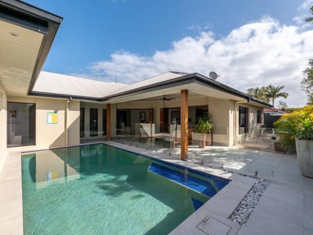An Impressive Gated Single Level Home With The Pool In The Heart Of The House