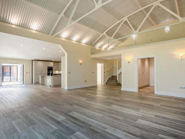 An impressive three bedroom luxurious barn conversion situated in a sought after village