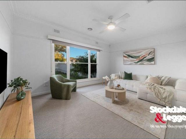 An Instant Charmer with Two Outdoor Entertainment Zones!