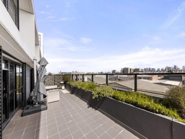 An Inside/Outside Apartment Stunner with Smart Updates