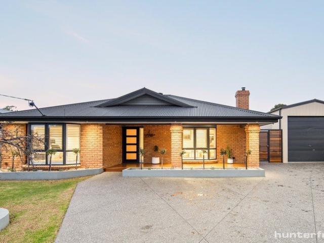An Opulent Family Sanctuary with Elite Workshop & Car Accommodation 3 Bed + Study | 2 Bath | 4+ Car Garage / Workshop | Inground Pool & Spa