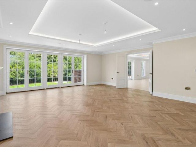 An outstanding contemporary residence offering expansive accommodation and exceptional leisure facilities, set within one of Surrey's most desirable locations