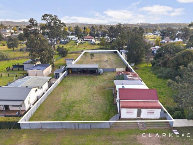 AN OUTSTANDING LANDHOLDING WITH DEVELOPMENT POTENTIAL!