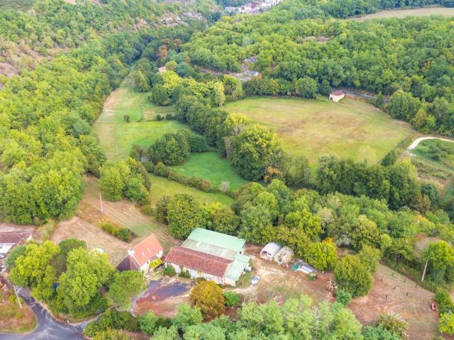 Ancien corps de ferme et son étang 150m² Blanquefort sur Briolance