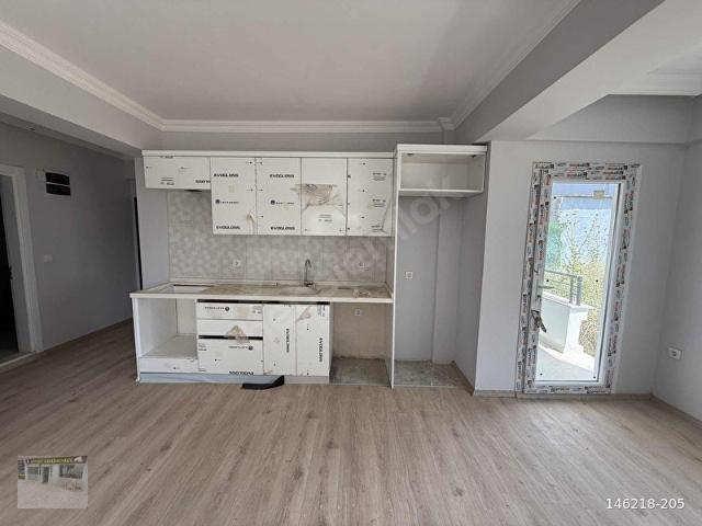 ÇANDARLI DA SIFIR GENİŞ BAHÇE KATI 2+1 ZEMİN DAİRE