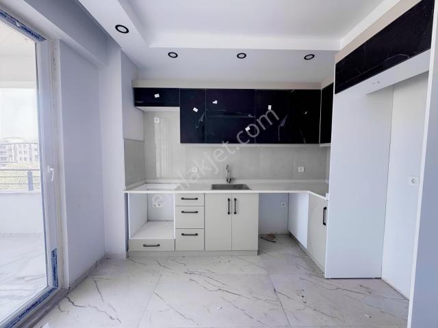 Çankaya'dan Gömeç Yaya'da Geniş Ara Kat 2+1 Sıfır Daire