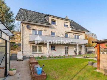 Ankommen und wohlfühlen Moderne Eigentumswohnung in 3 Familienhaus mit Charme und Garten