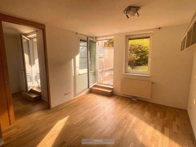 ANLEGERHIT FREI VERMIETBARE 2 ZIMMER WOHNUNG MIT GARTENTERRASSE UND GARAGE IN HOFRUHELAGE