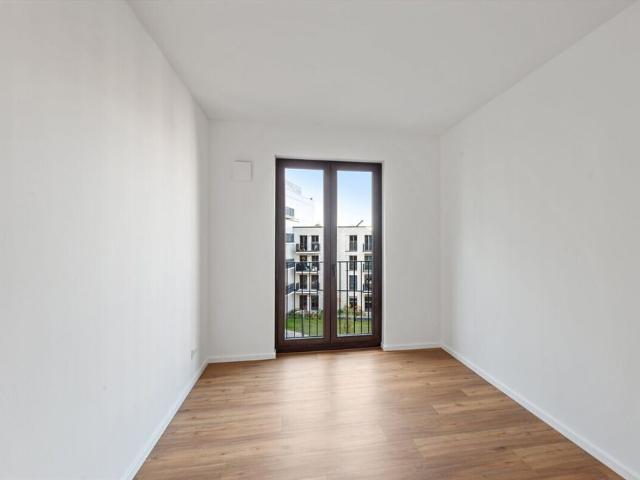 Ansprechende Neubauwohnung mit Einbauküche, 4 Schlafzimmern und Bad en Suite!
