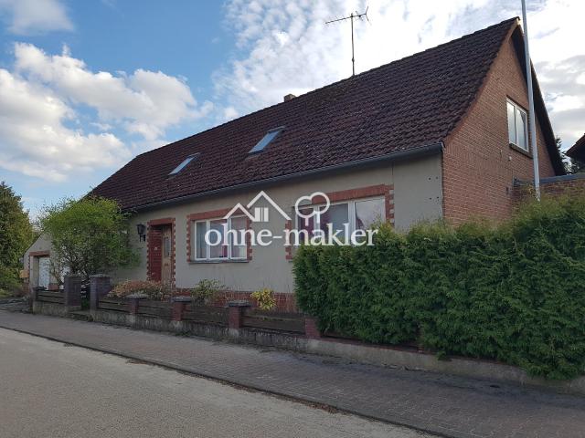 Ansprechendes Zweifamilienhaus mit großzügigem Grundstück und geschlossenem Hof in idyllischer Lage