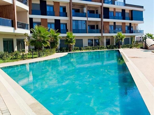 ANTALYA DÖŞEMEALTI ALTINKALEDE SIFIR 1+1 BAHÇE KAT GÜNEY CEPHE