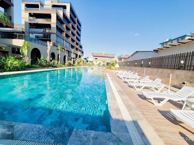 ANTALYA HAVALİMANINA YAKIN HAVUZLU LÜKS SİTEDE SATILIK 1+1
