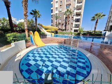 Antalya Konyaaltı Uncalı Mahallesinde Havuzlu Güvenlikli Sitede Doğalgaz Kombili Kiralık 3+1 Daire