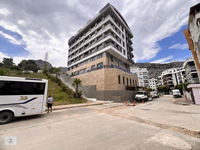 ANTALYA KONYAALTI LÜKS SİTE İÇİNDE KATTA SIFIR 2+1 SATILIK DAİRE