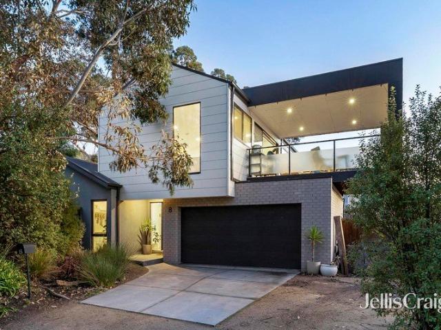 As New Beachside Family Home with Bay Views